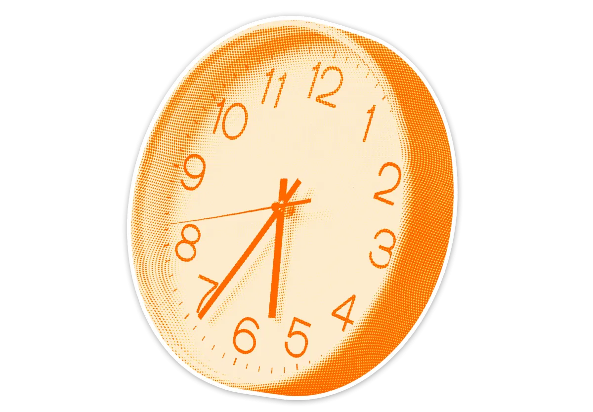 zegar ścienny pokazujący godzinę 17:34