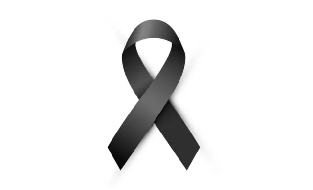 Czarna wstążka w kształcie pętli, symbol żałoby.