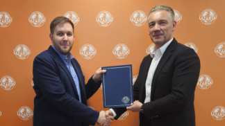 Uczelnia Łazarskiego i Fundacja INFO OPS Polska - nowe partnerstwo na rzecz bezpieczniejszej przyszłości cyfrowej