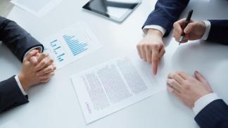 top view of businessman signing documents 1098 3387