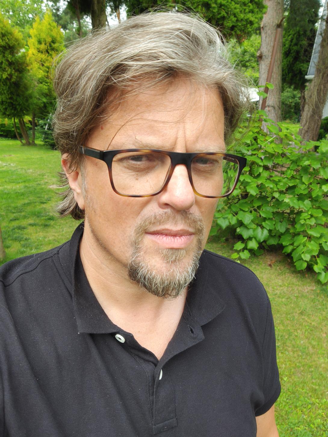 zdjęcie Tomasza Woźniakowskiego, portret